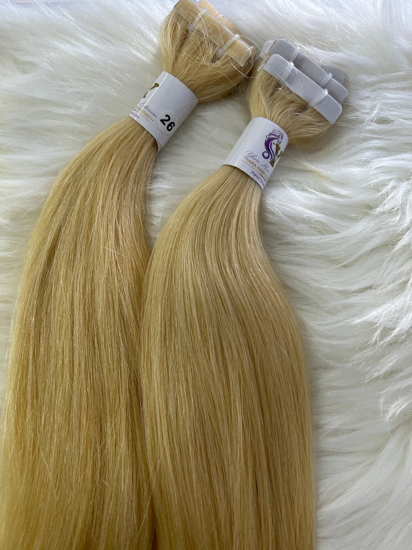 Extensiones de tape-in 26’ rubio #613