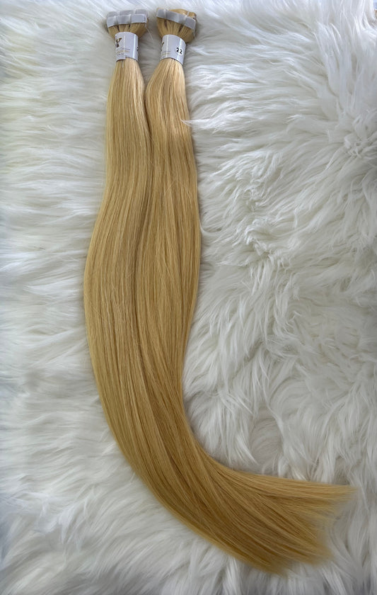 Extensiones tape-in 22’ rubio #613