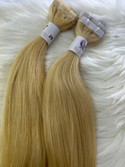 Extensiones de tape-in 26’ rubio #613